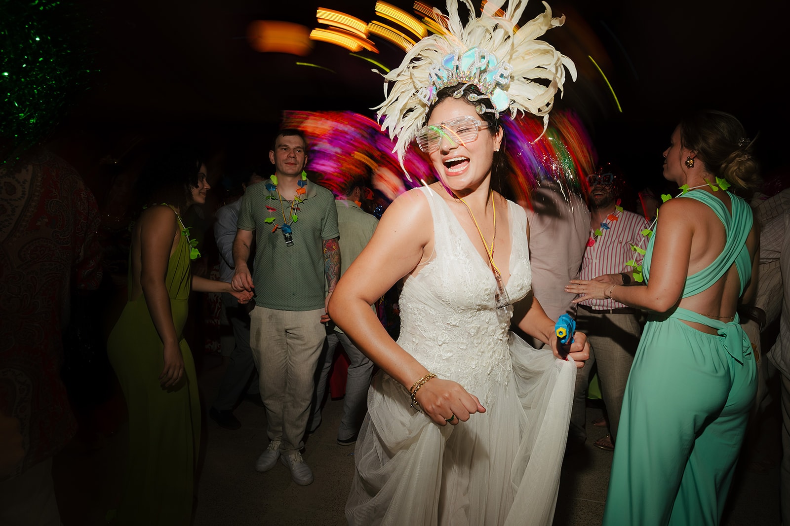 Bride dancing at vibrant reception party