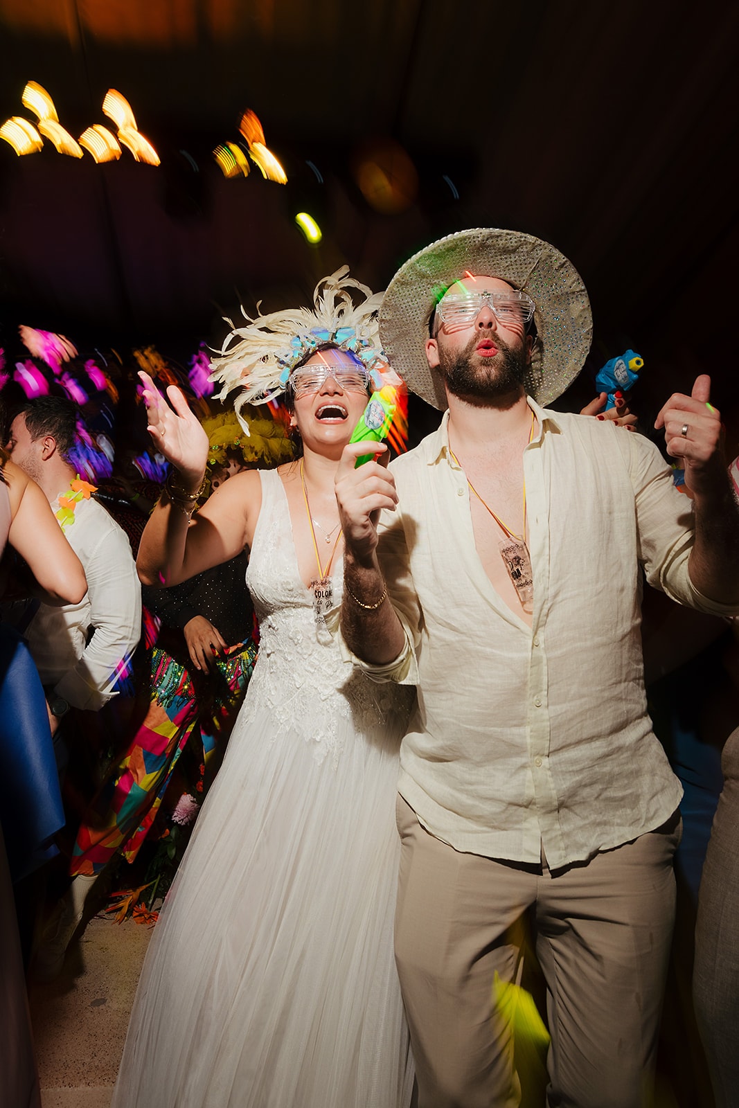 Couple dancing together at festive wedding celebration